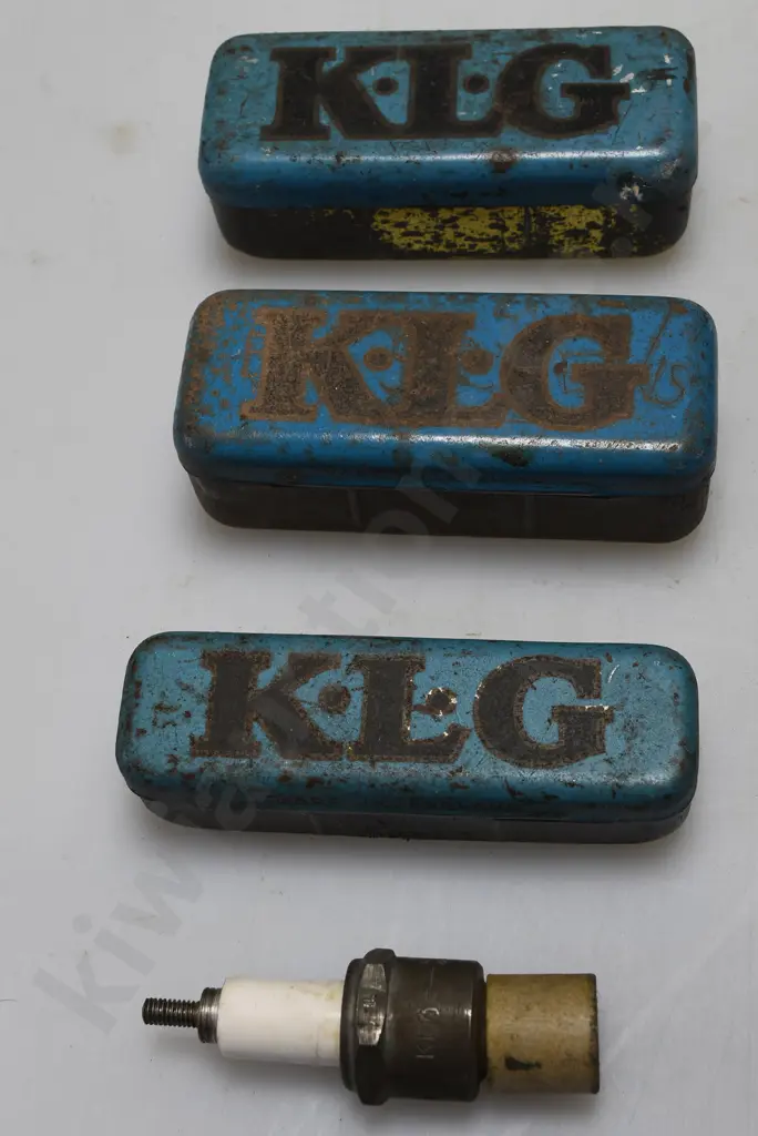 ASSORTED SPARKPLUG TINS Image 1++