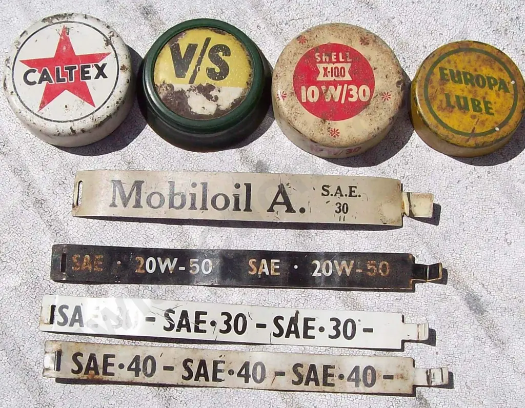 OIL BOTTLE CAPS & STRAPS Image 1++