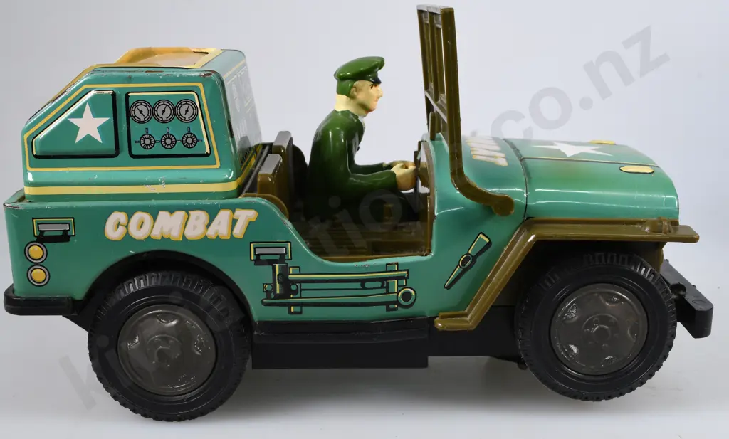 TIN PLATED BATTERY OPERATED COMBAT JEEP Image 1++