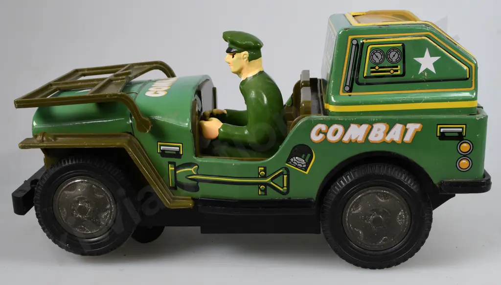 TIN PLATED BATTERY OPERATED COMBAT JEEP Image 1++