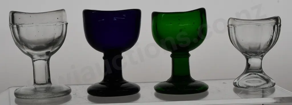 COLLECTION OF GLASS EYE BATHS Image 1++