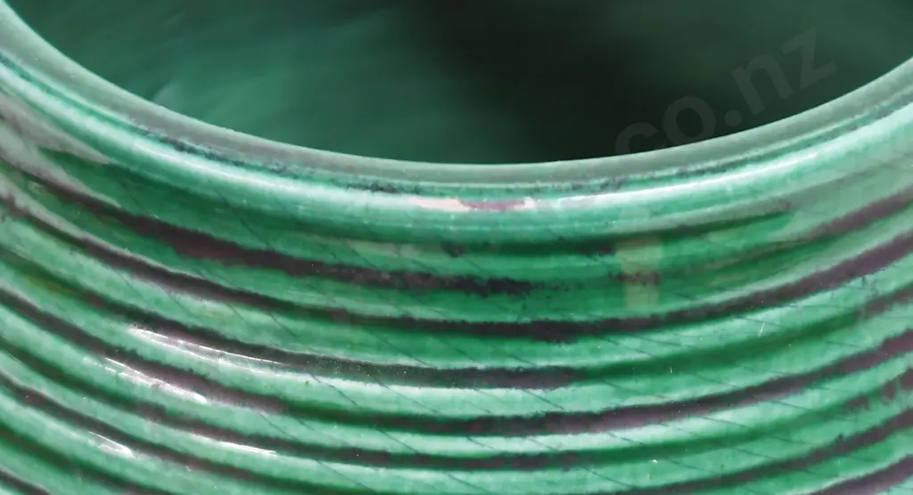 O C STEPHENS RIBBED DARK GREEN VASE Image 1++