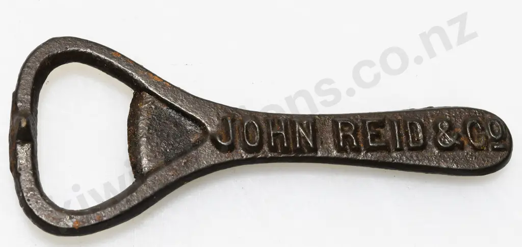 JOHN REID & CO AUCKLAND CAST BOTTLE OPENER Image 1++