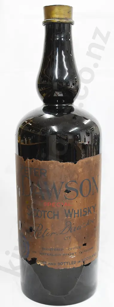 EXTRA LARGE BLACK GLASS WHISKY BOTTLE, LABEL FOR PETER DAWSON Image 1++