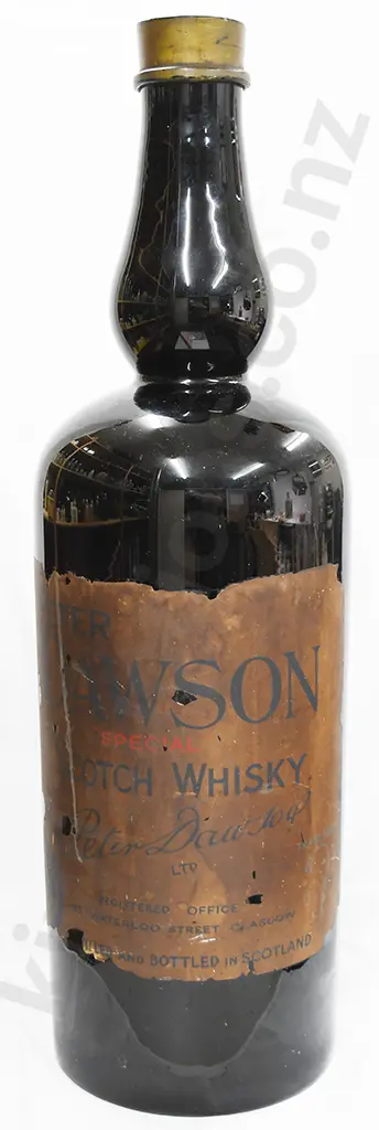 EXTRA LARGE BLACK GLASS WHISKY BOTTLE, LABEL FOR PETER DAWSON Image 1++