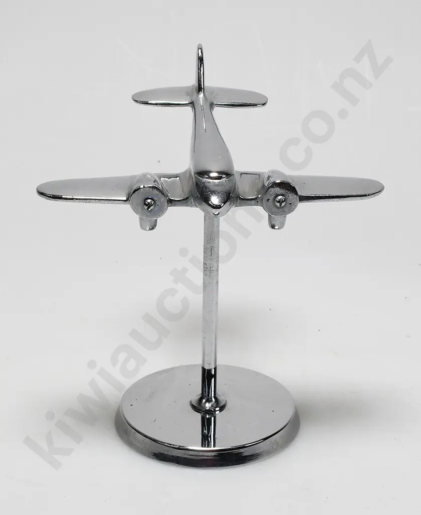 CHROME PLATED MODEL AIRPLANE ON STAND Image 1++