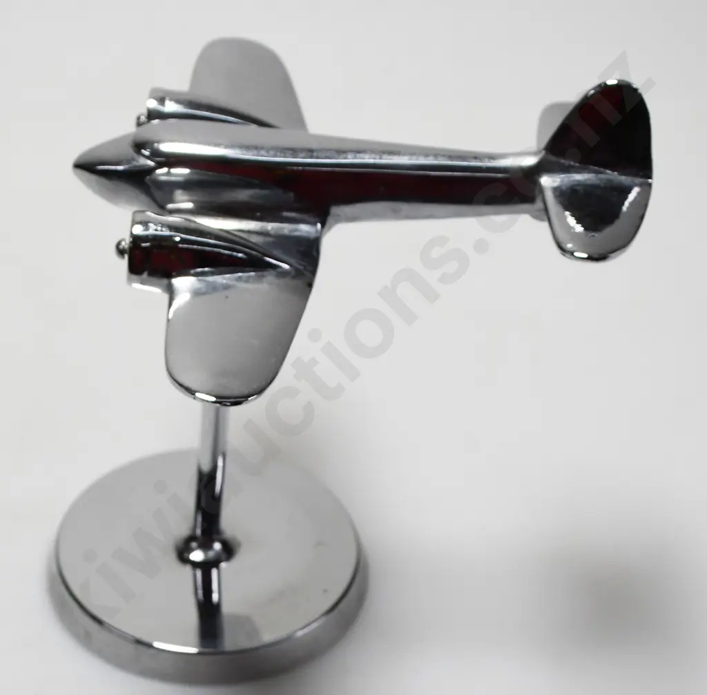 CHROME PLATED MODEL AIRPLANE ON STAND Image 1++