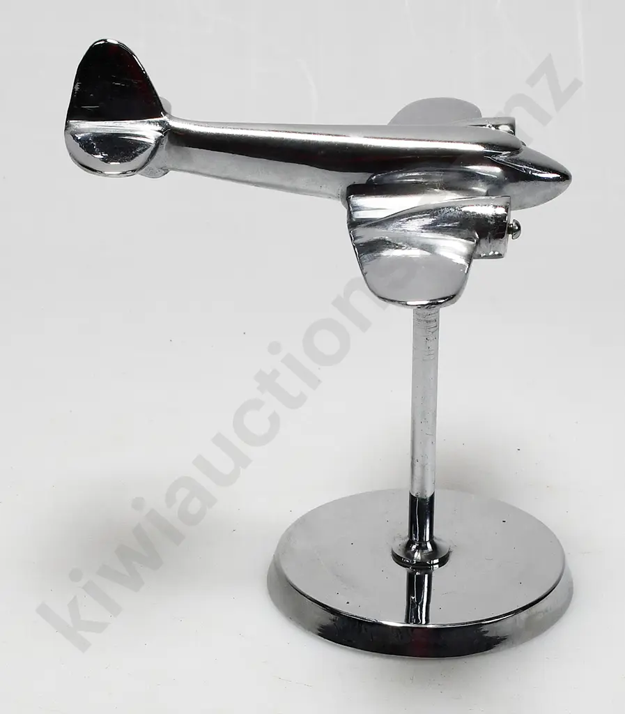 CHROME PLATED MODEL AIRPLANE ON STAND Image 1++