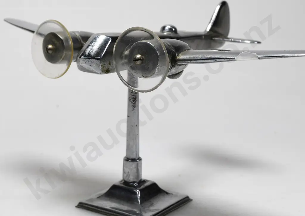 CHROME PLATED MODEL AIRPLANE ON STAND Image 1++