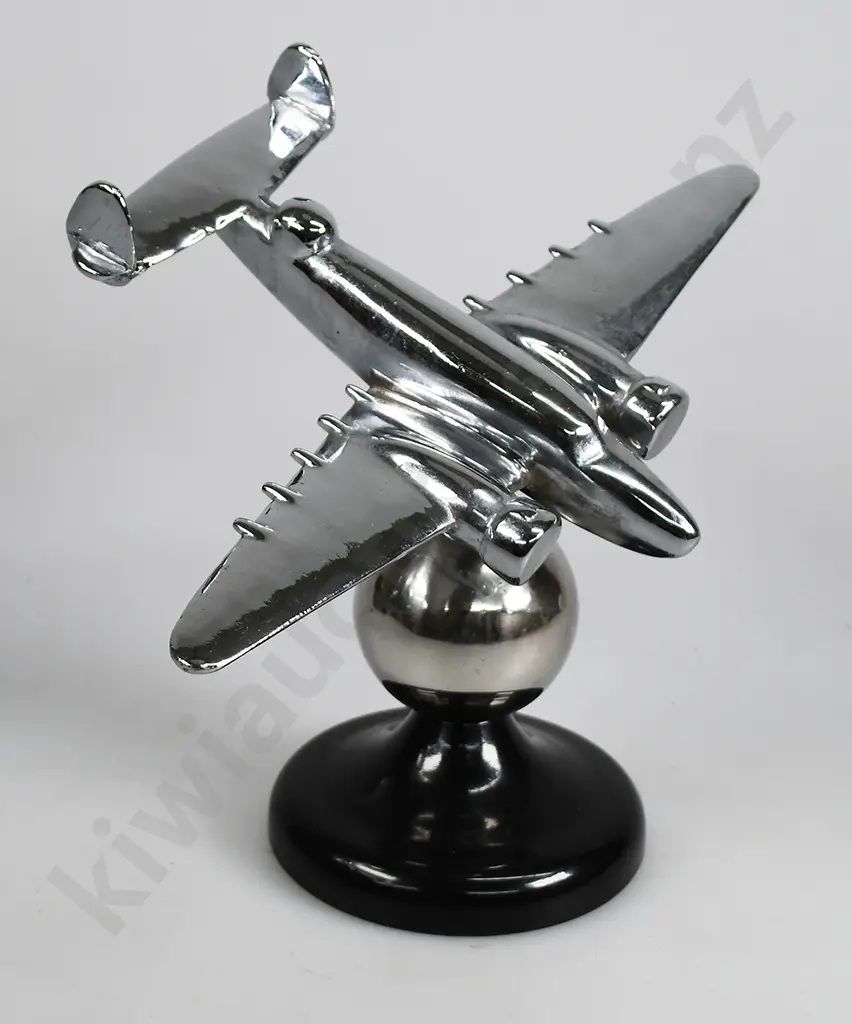 CHROME PLATED MODEL AIRPLANE ON STAND Image 1++