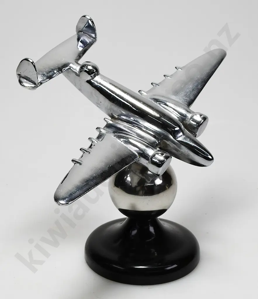CHROME PLATED MODEL AIRPLANE ON STAND Image 1++