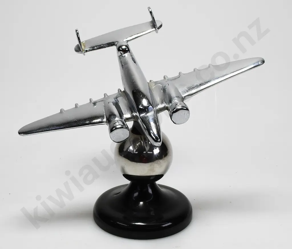 CHROME PLATED MODEL AIRPLANE ON STAND Image 1++