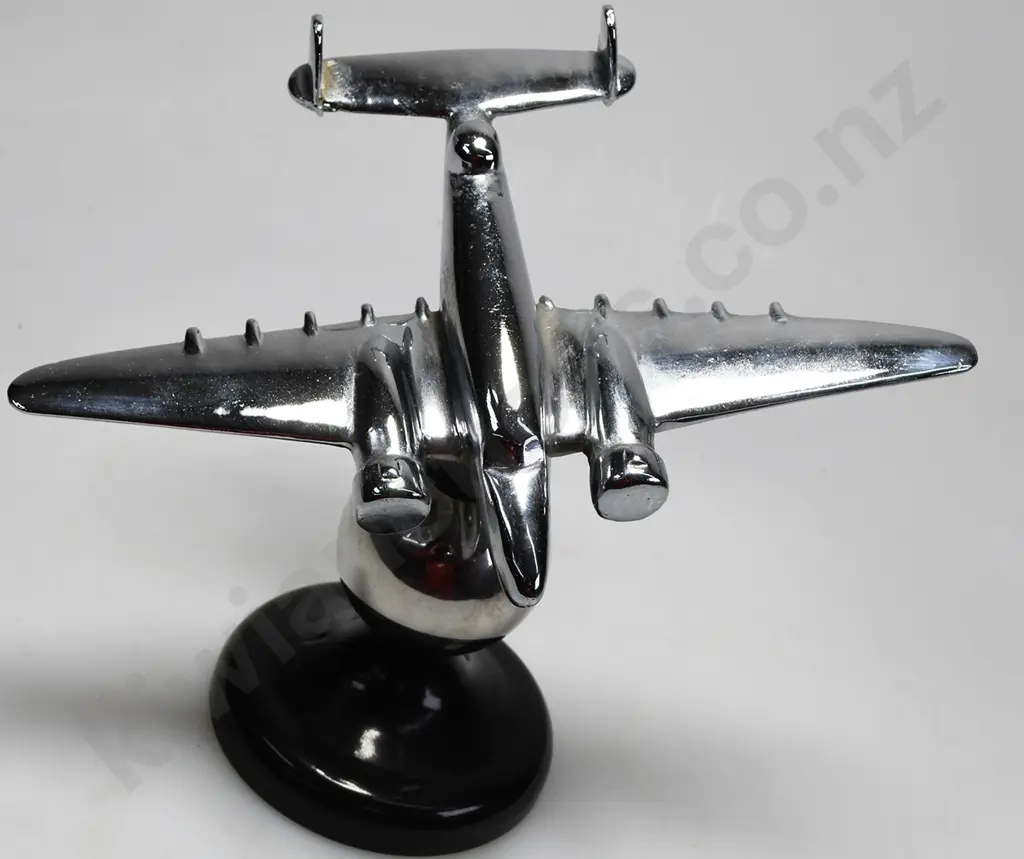CHROME PLATED MODEL AIRPLANE ON STAND Image 1++