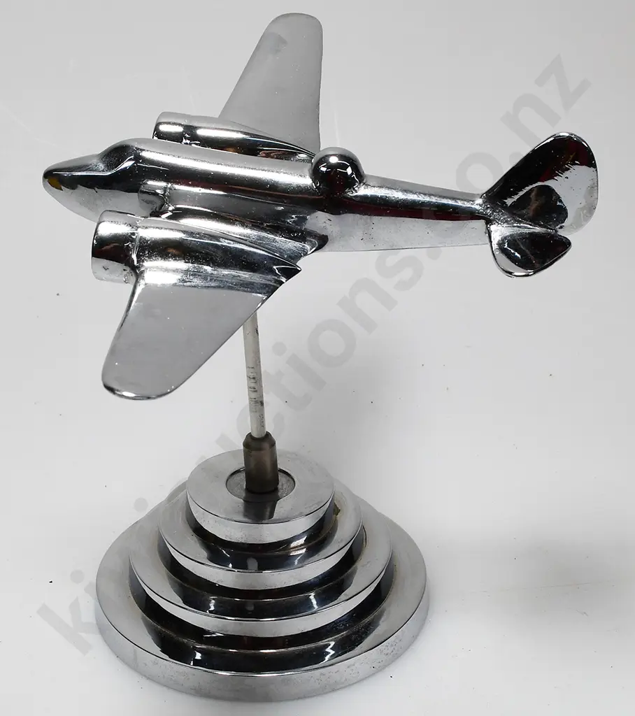 CHROME PLATED MODEL AIRPLANE ON STAND Image 1++