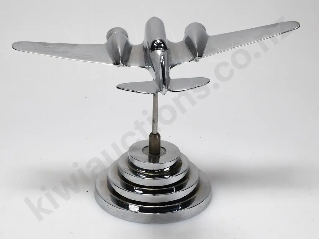 CHROME PLATED MODEL AIRPLANE ON STAND Image 1++
