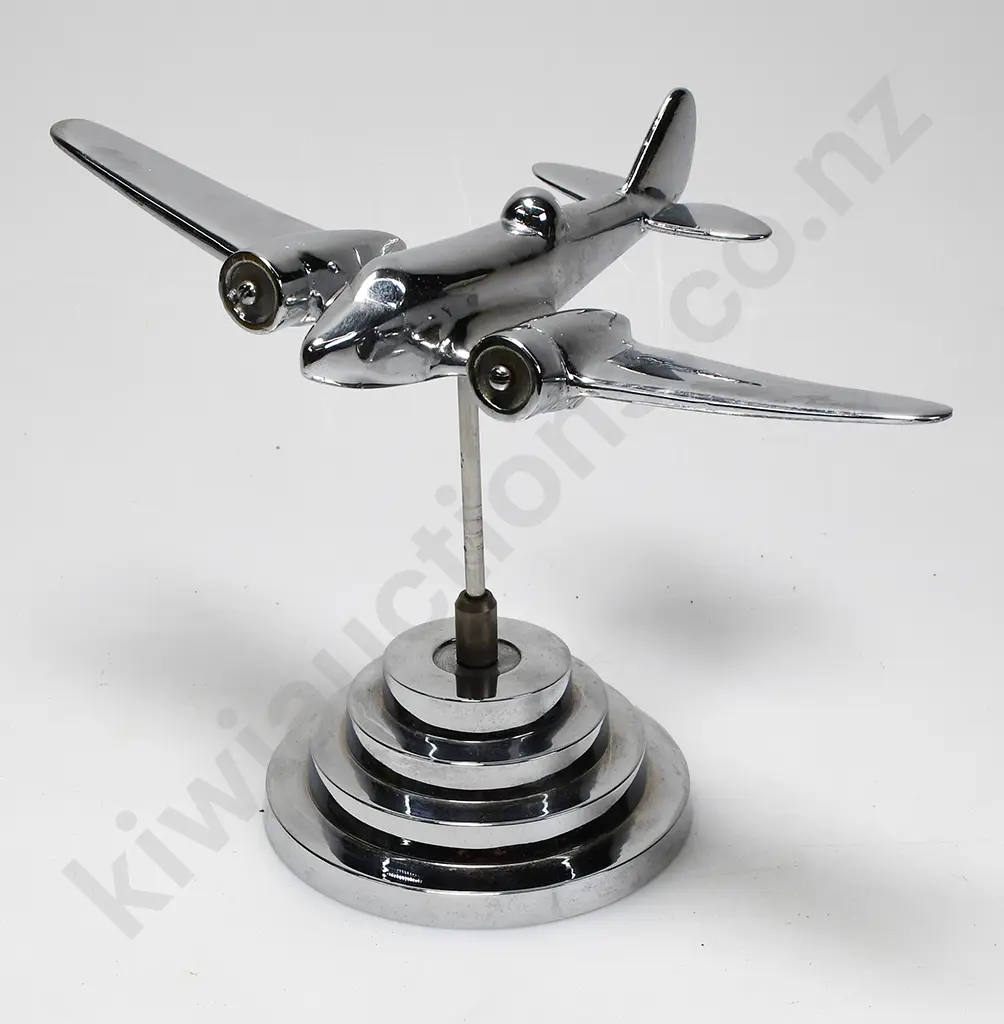 CHROME PLATED MODEL AIRPLANE ON STAND Image 1++