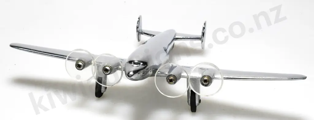 CHROME PLATED MODEL AIRPLANE ON STAND Image 1++