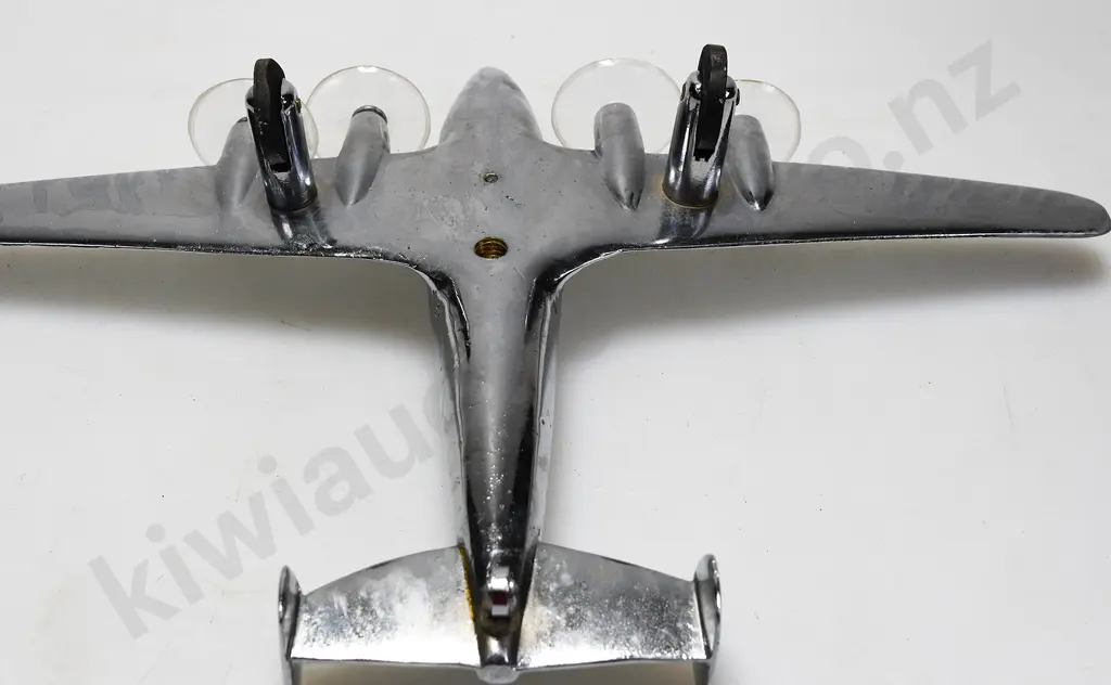 CHROME PLATED MODEL AIRPLANE ON STAND Image 1++