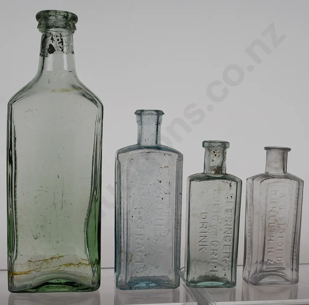 DUNEDIN CURES, SEWING MACHINE BOTTLES Image 1++