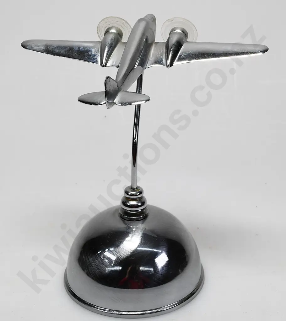 CHROME PLATED MODEL AIRPLANE ON STAND Image 1++