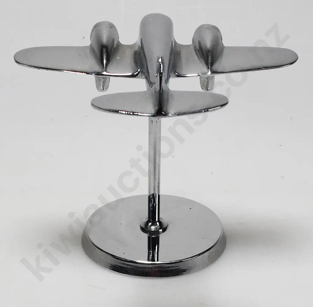CHROME PLATED MODEL AIRPLANE ON STAND Image 1++
