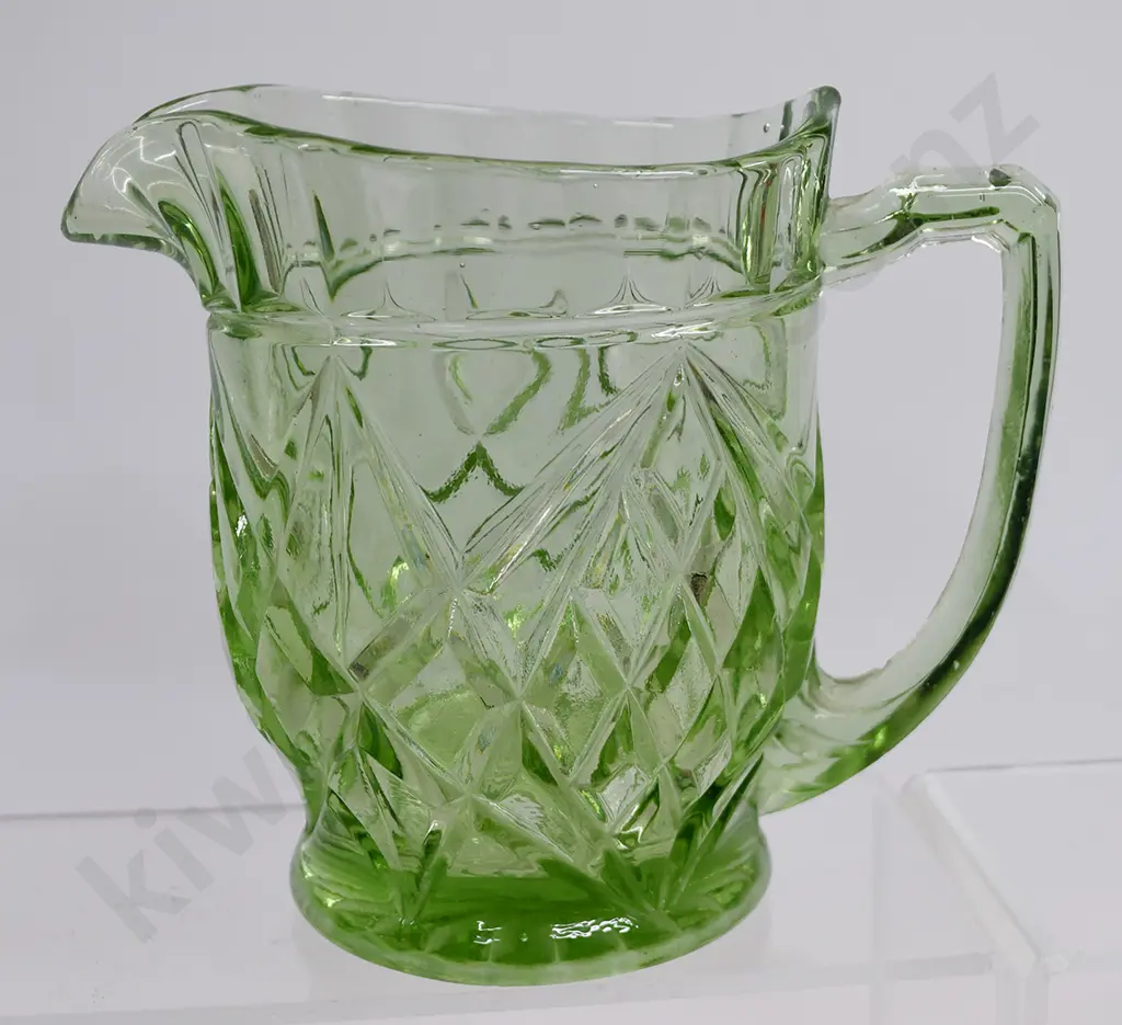 DEPRESSION GLASS JUGS IN GREEN. Image 1++
