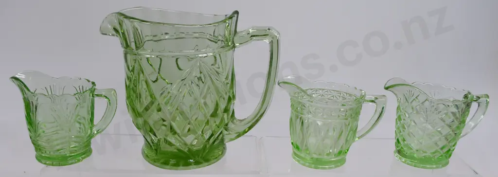 DEPRESSION GLASS JUGS IN GREEN. Image 1++