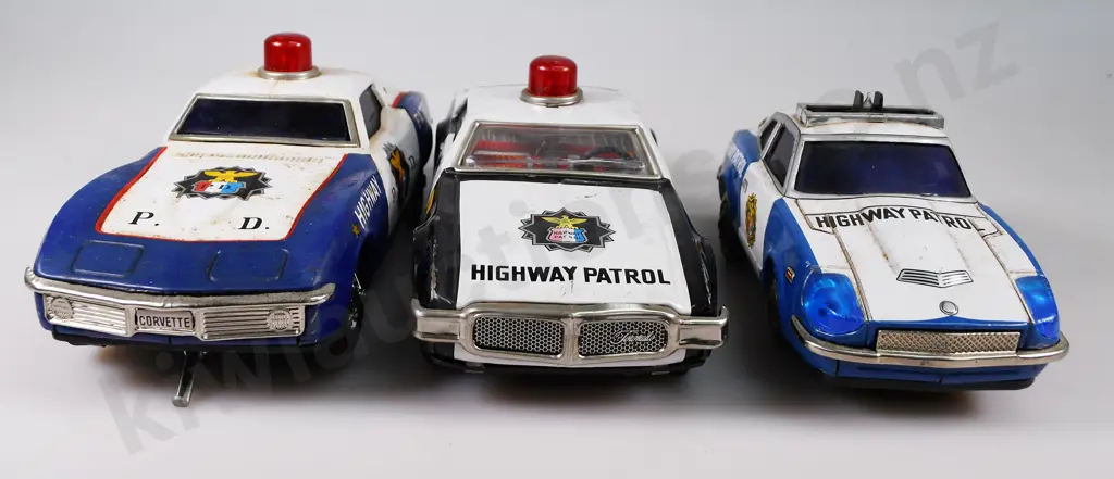 HIGHWAY PATROL PRESSED TIN CARS Image 1++