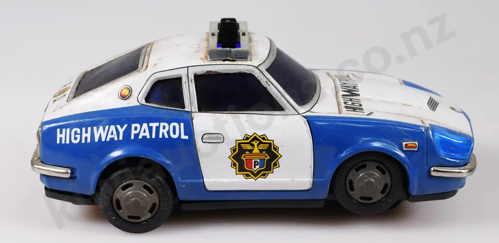 HIGHWAY PATROL PRESSED TIN CARS Image 1++