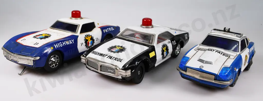 HIGHWAY PATROL PRESSED TIN CARS Image 1++