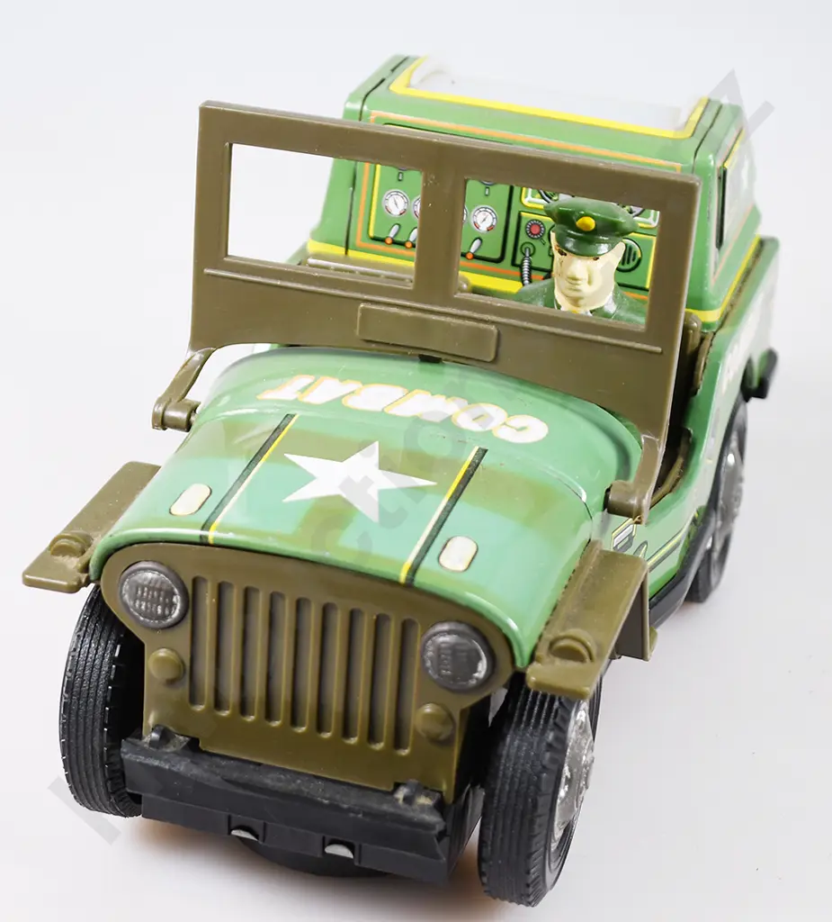 TIN PLATED BATTERY OPERATED COMBAT JEEP Image 1++