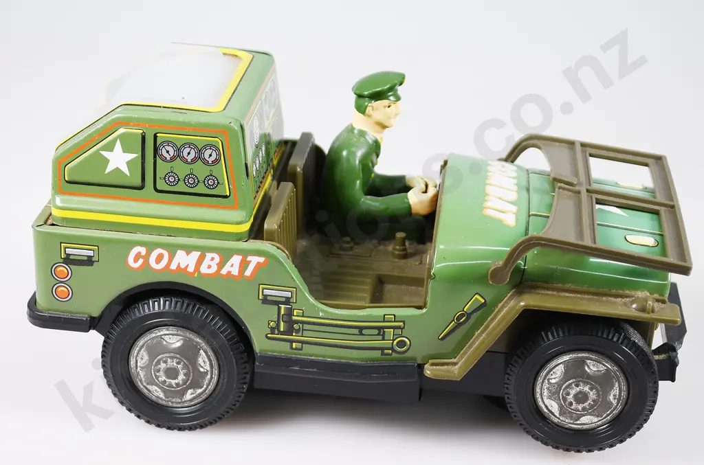 TIN PLATED BATTERY OPERATED COMBAT JEEP Image 1++
