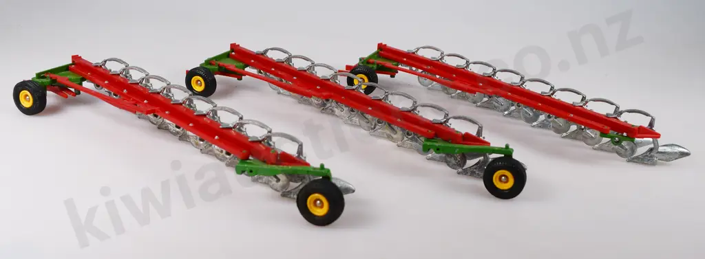 BRITAINS FARM IMPLEMENT 8 FURROW PLOUGHS Image 1++