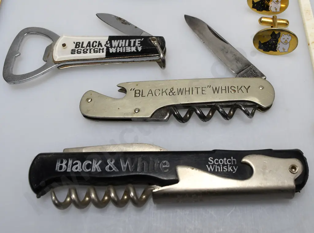 ASSORTED BLACK AND WHITE COLLECTABLES Image 1++