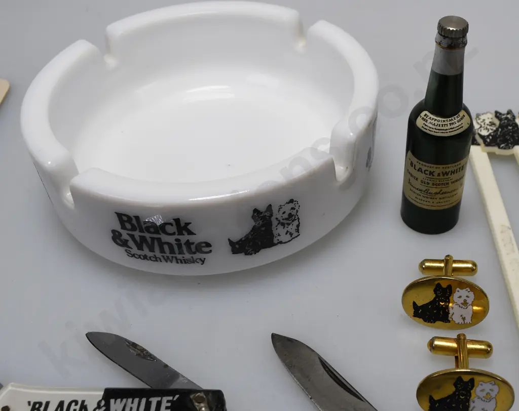 ASSORTED BLACK AND WHITE COLLECTABLES Image 1++