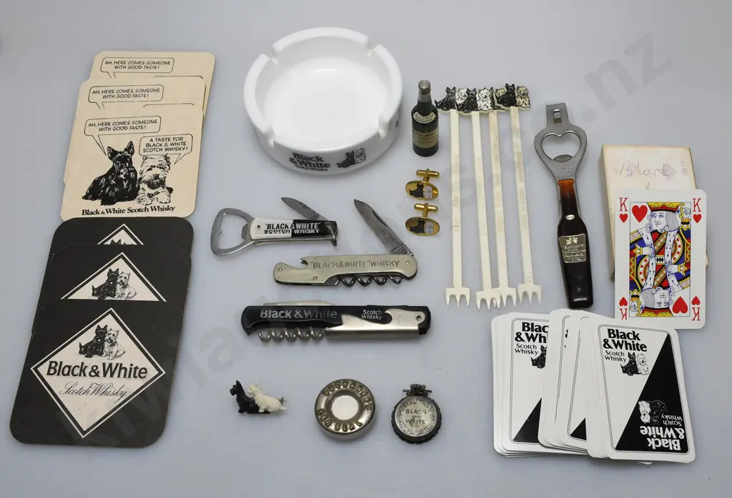 ASSORTED BLACK AND WHITE COLLECTABLES Image 1++