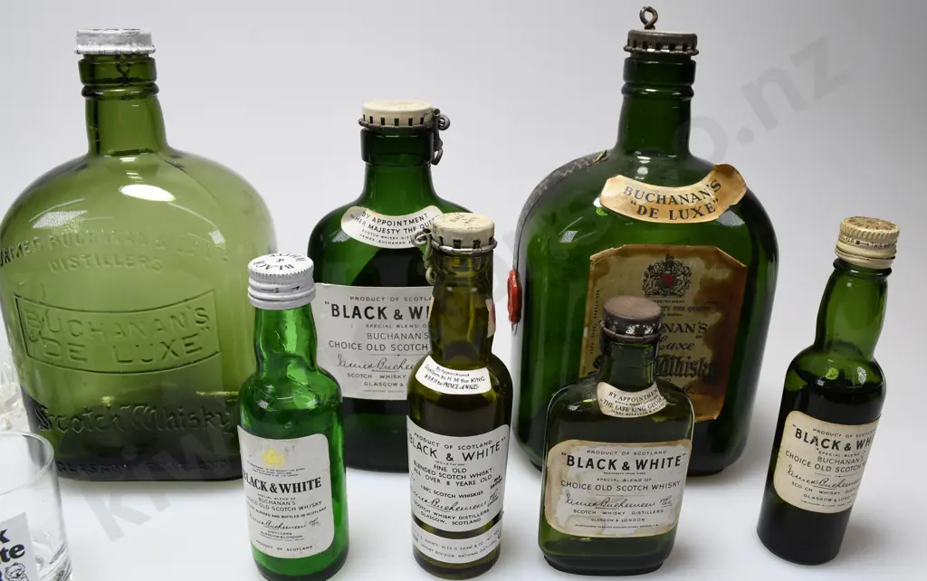 BLACK & WHITE BOTTLES AND GLASSES. Image 1++