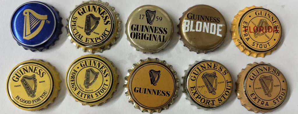 GUINNESS BOTTLE CAPS 25 DIFFERENT Image 1++