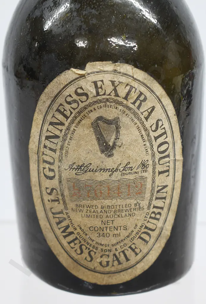 GUINNESS LABEL ON BLACK GLASS BEER Image 1++