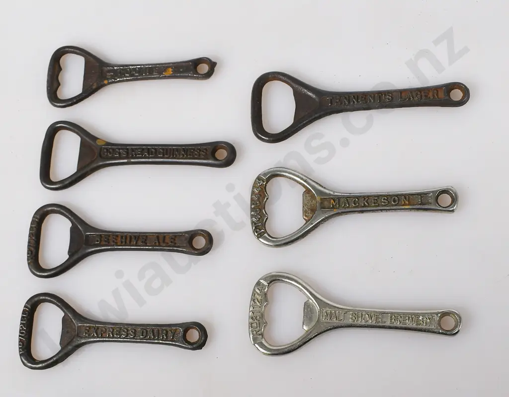ASSORTED CAST IRON BOTTLE OPENERS Image 1++