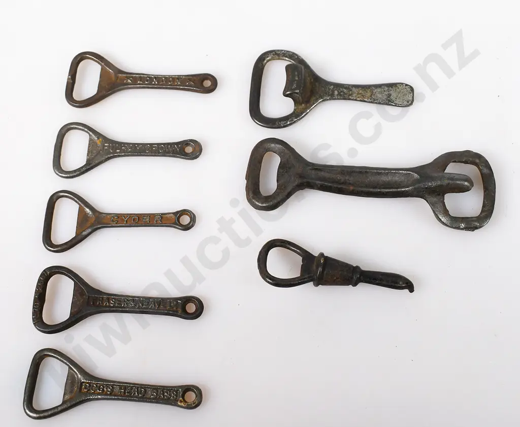 ASSORTED CAST IRON BOTTLE OPENERS Image 1++