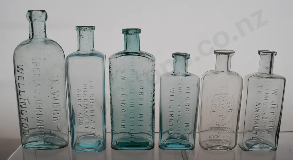 NORTH ISLAND CHEMIST BOTTLES Image 1++
