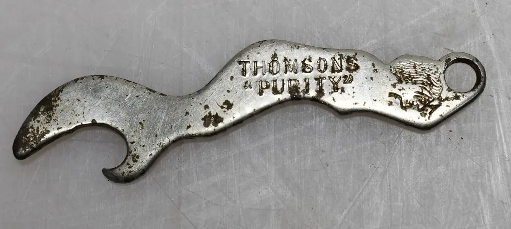 THOMSON'S PURITY FIGURAL BOTTLE OPENER Image 1++