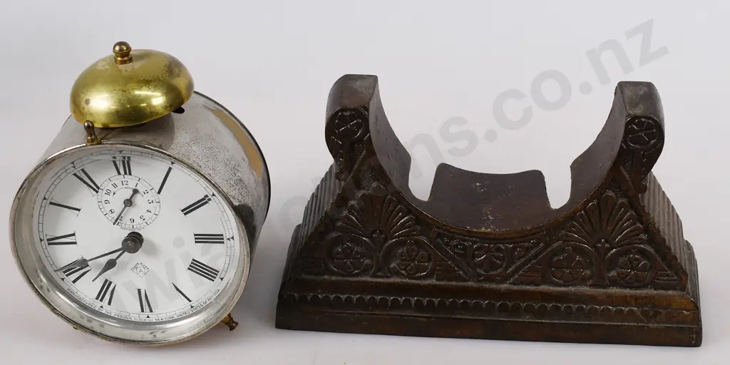 ANSONIA ALARM CLOCK IN CAST METAL STAND Image 1++