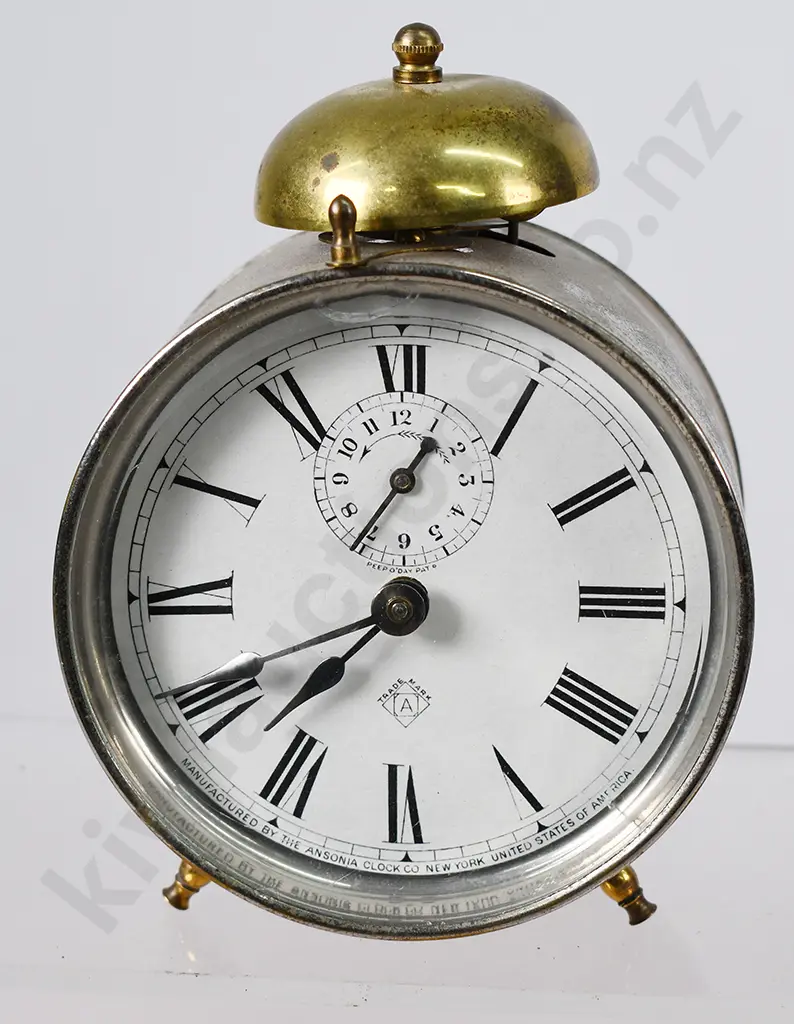 ANSONIA ALARM CLOCK IN CAST METAL STAND Image 1++