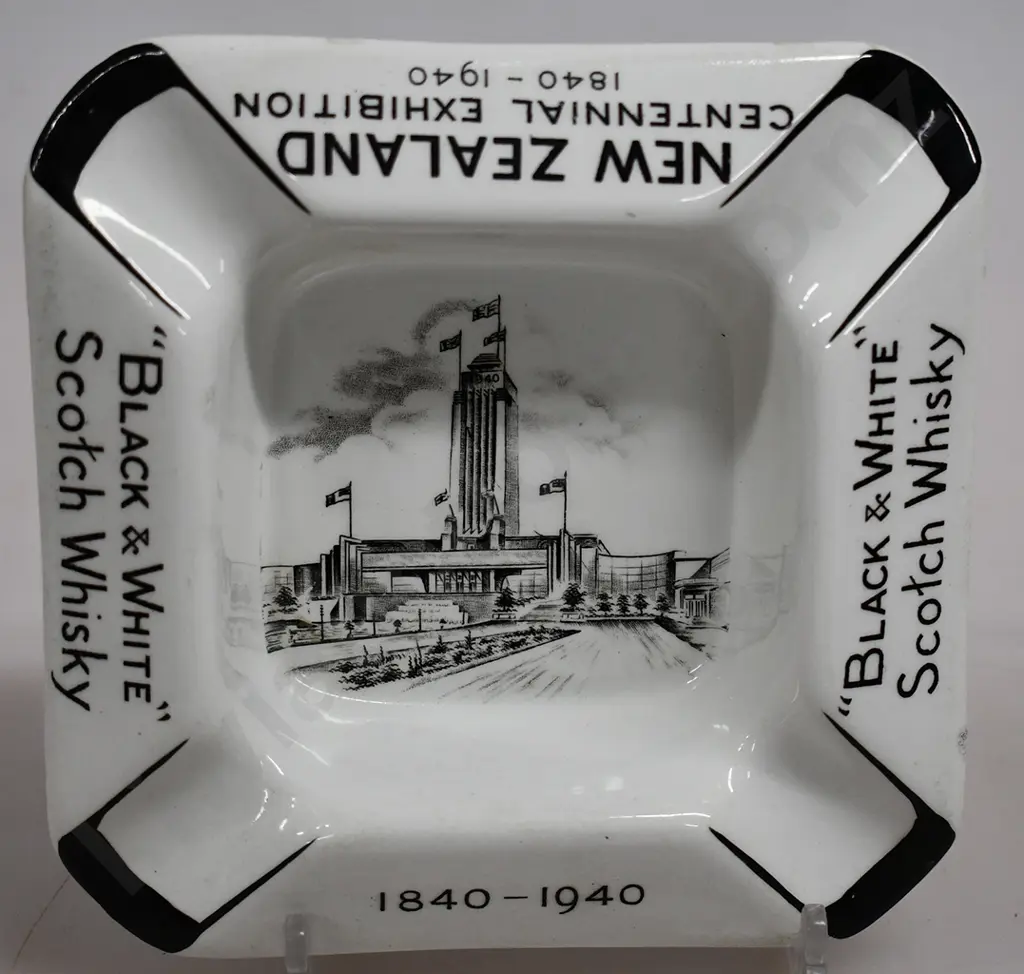NZ EXHIBITION BLACK & WHITE WHISKY ASHTRAY Image 1++