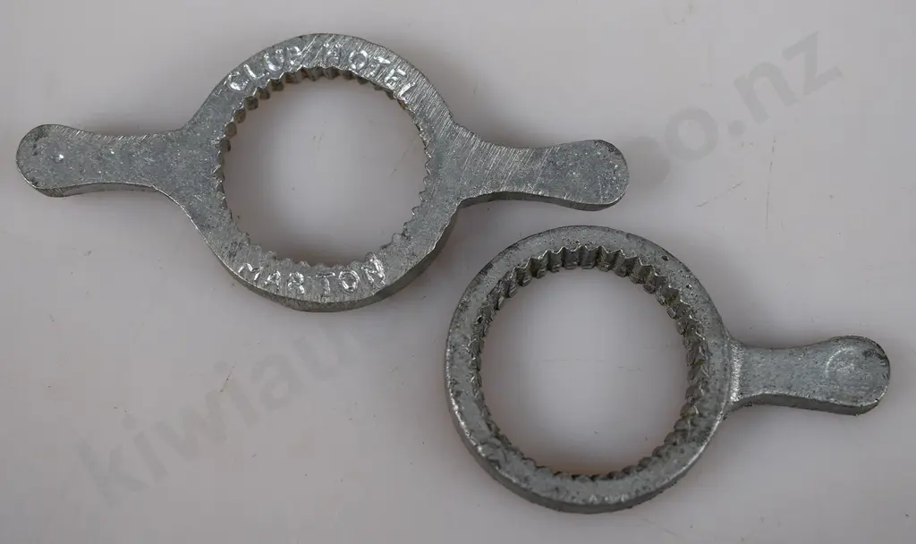 ASSORTED CAST IRON BOTTLE OPENERS Image 1++