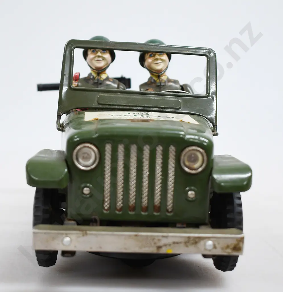 TIN PLATED BATTERY OPERATED ARMY JEEP Image 1++