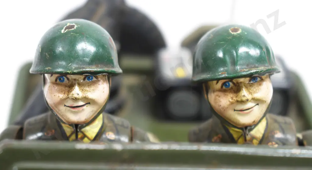 TIN PLATED BATTERY OPERATED ARMY JEEP Image 1++