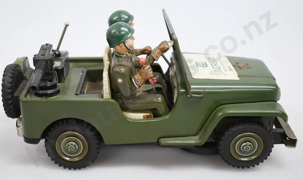 TIN PLATED BATTERY OPERATED ARMY JEEP Image 1++